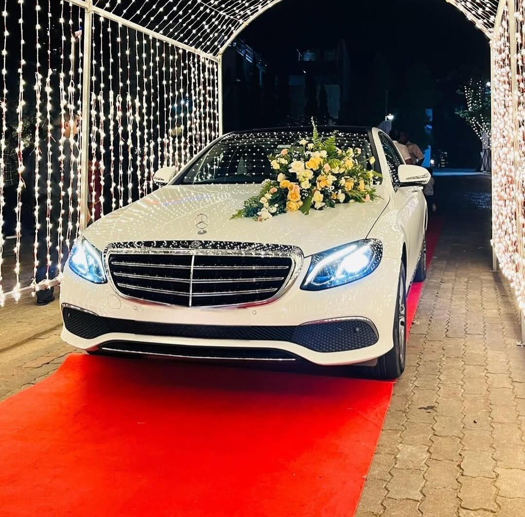 Mercedes wedding car at a decorated venue
