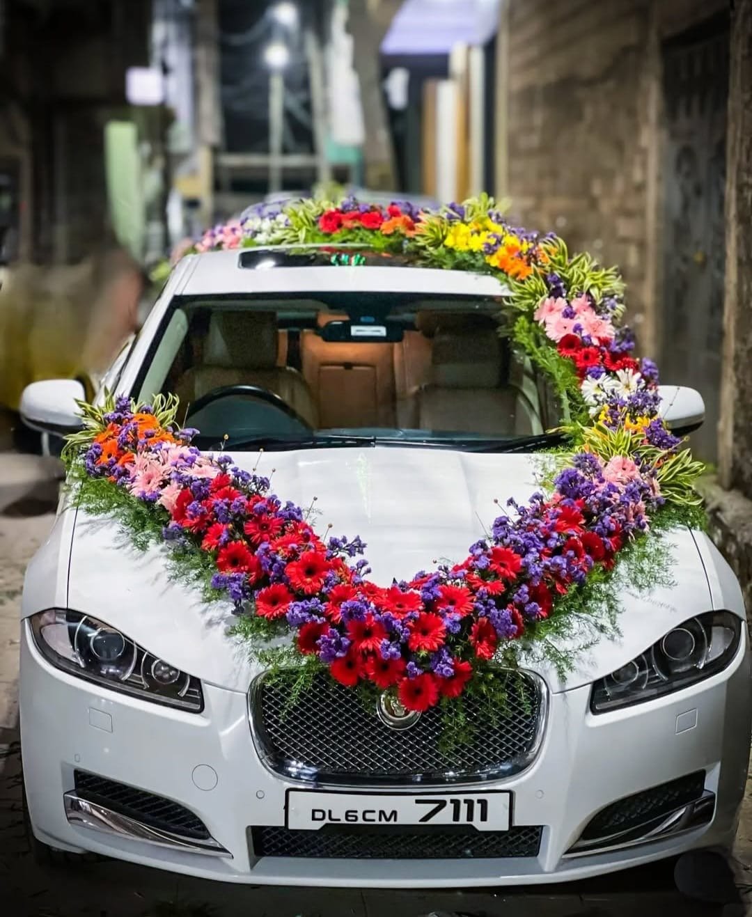 Front view of a decorated wedding car